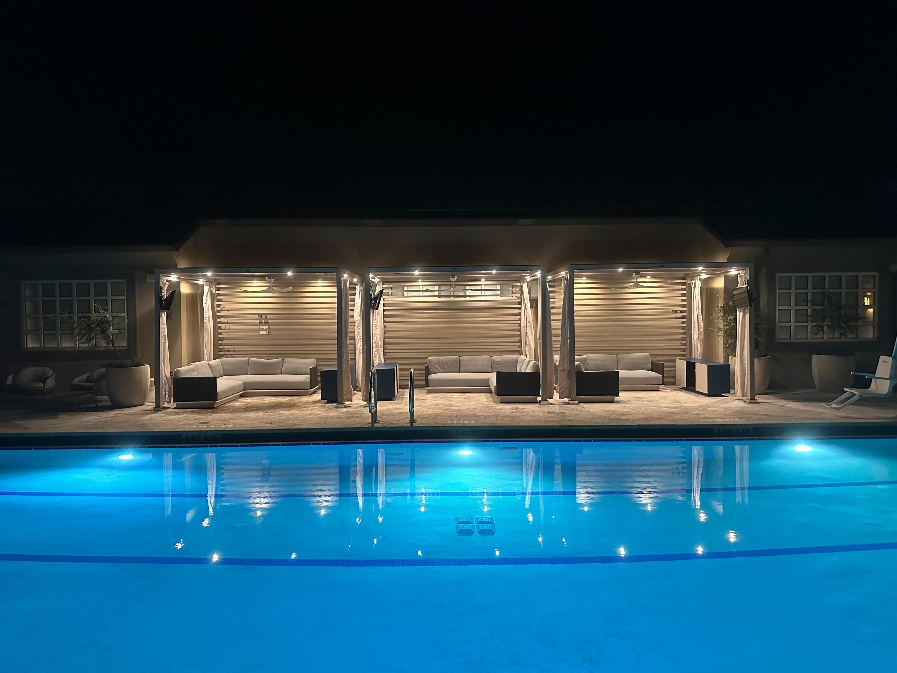 Luxury resort pool environment at night